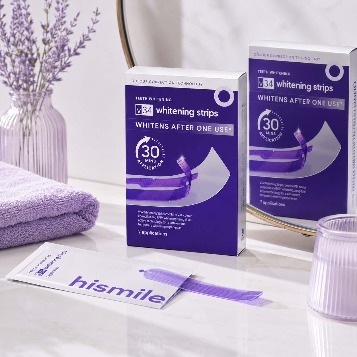 V34 Whitening Strips packaging on a bathroom counter with lavender-themed decor.